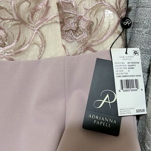 Brand new. Size 0 dress. But will fit a size 4